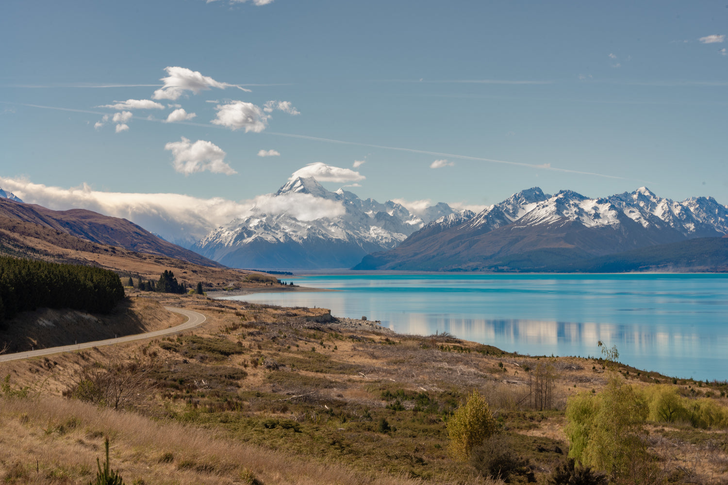 An alpine lake in New Zealand with mountains in the background