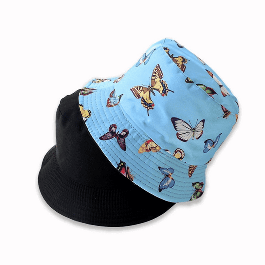 Blue reversible bucket hat with butterfly pattern