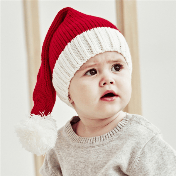 baby wearing santa hat