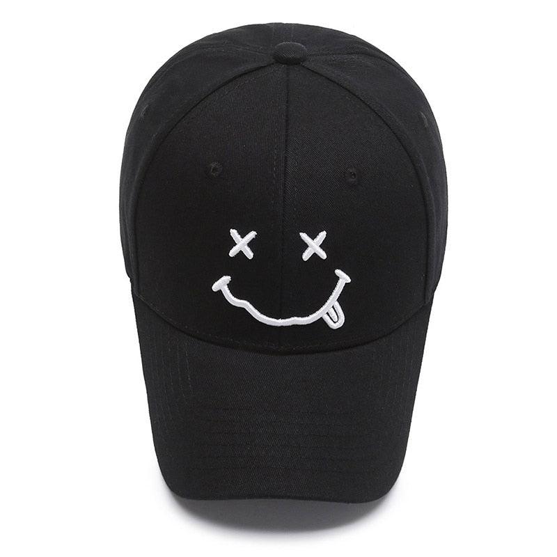 Baseball Cap with tongue smile on front.