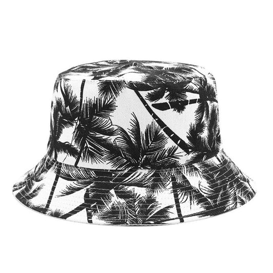 Bucket hat with black and white coconut trees on it.