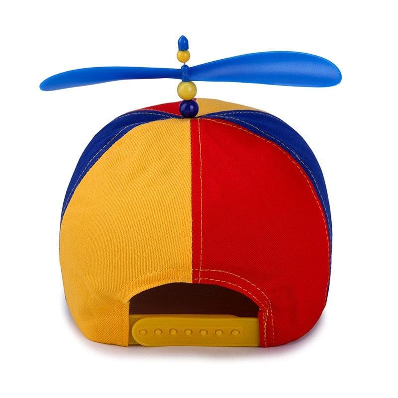 Rainbow coloured hat with propeller on top